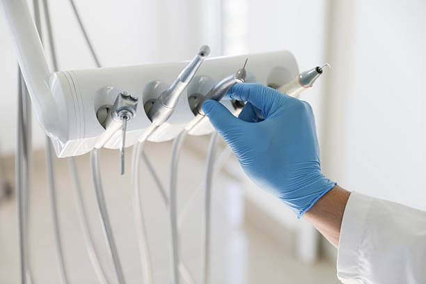 Professional Root Canal Treatment technician working in Newark, AR